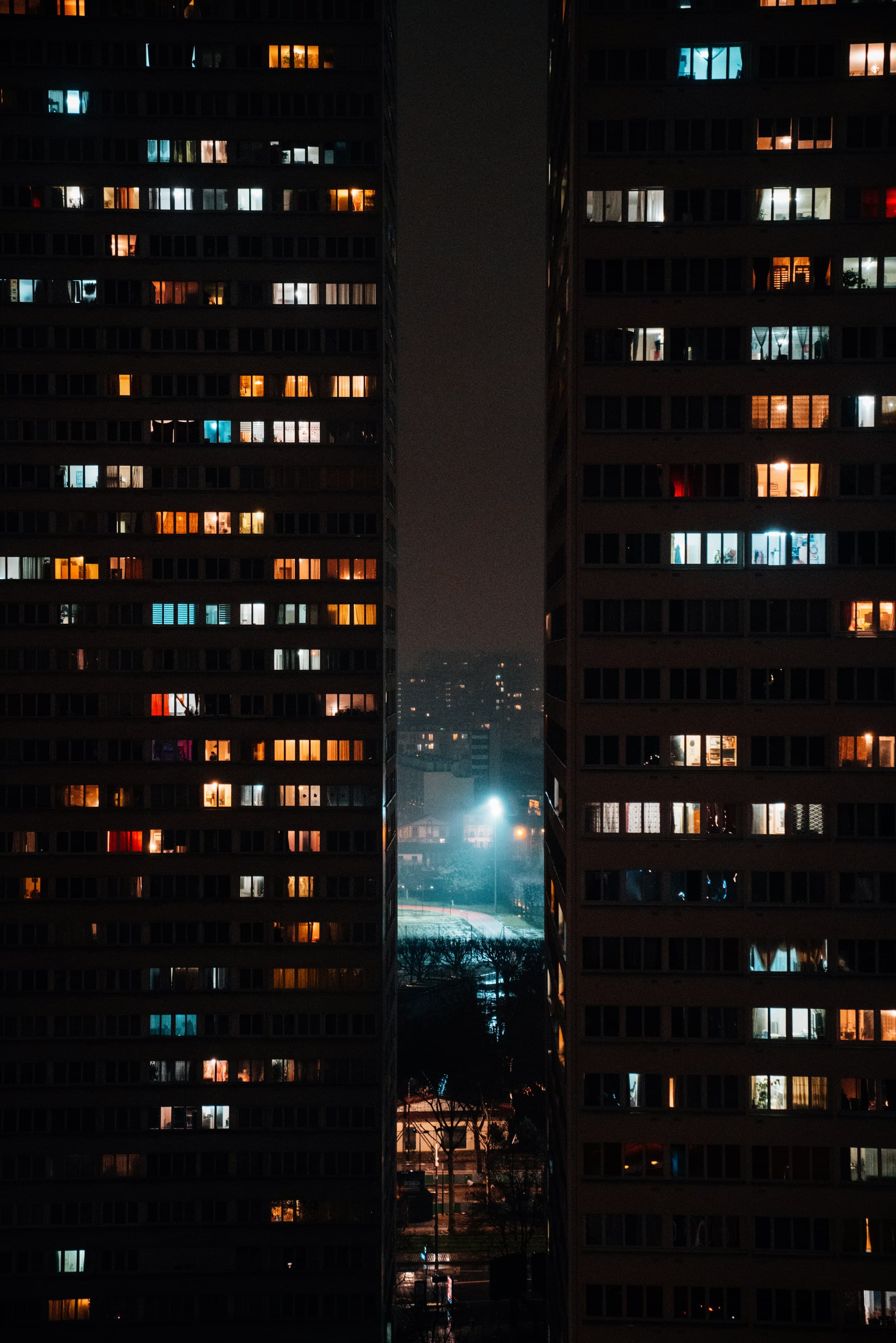 Brown concrete building facade at night