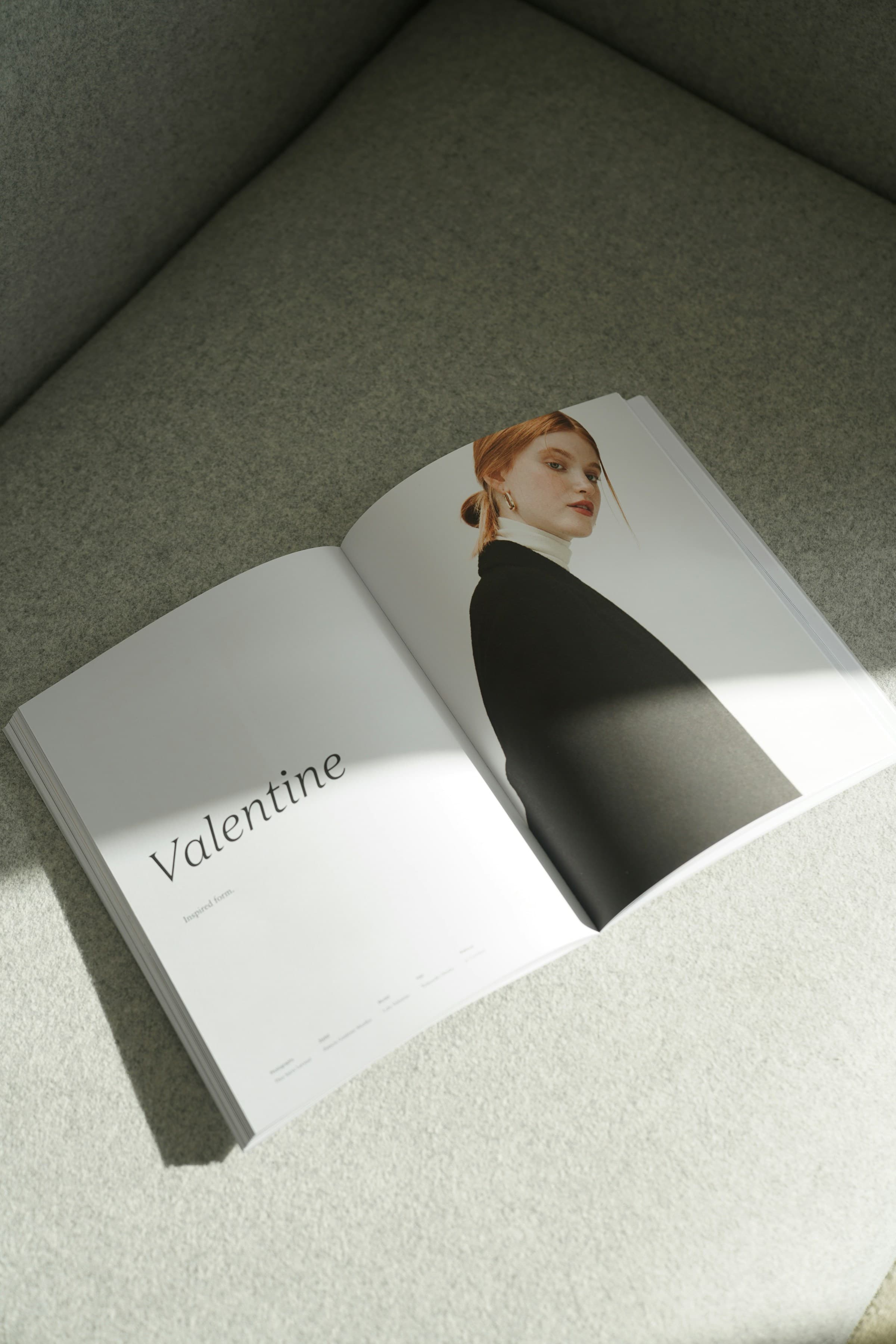 Open magazine spread resting on a plain surface